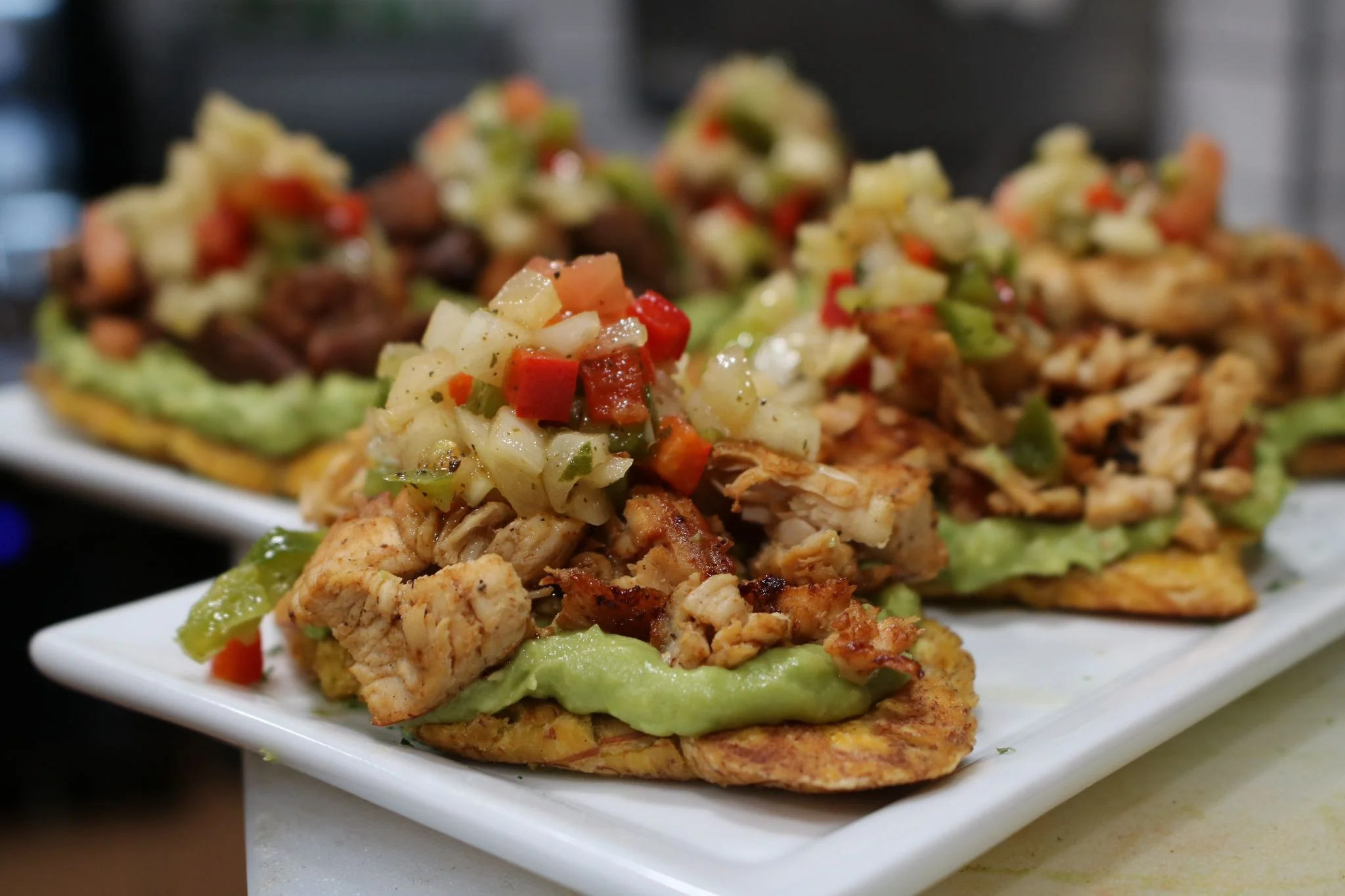 Delicious Mexican tostadas topped with grilled chicken and fresh salsa