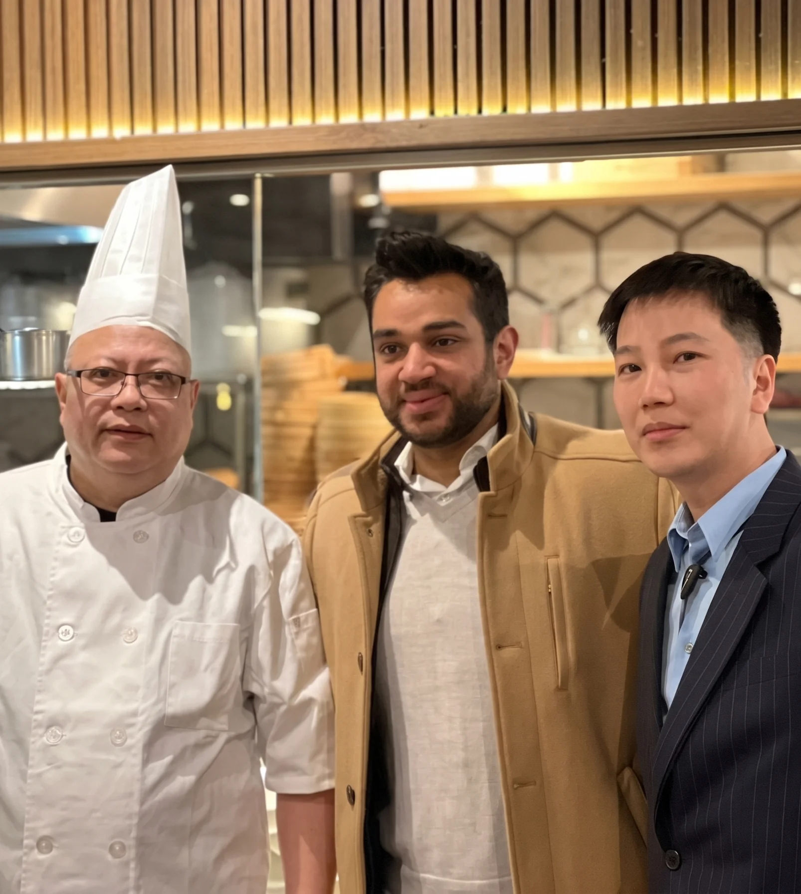 Chefs and restaurant team in a modern kitchen setting