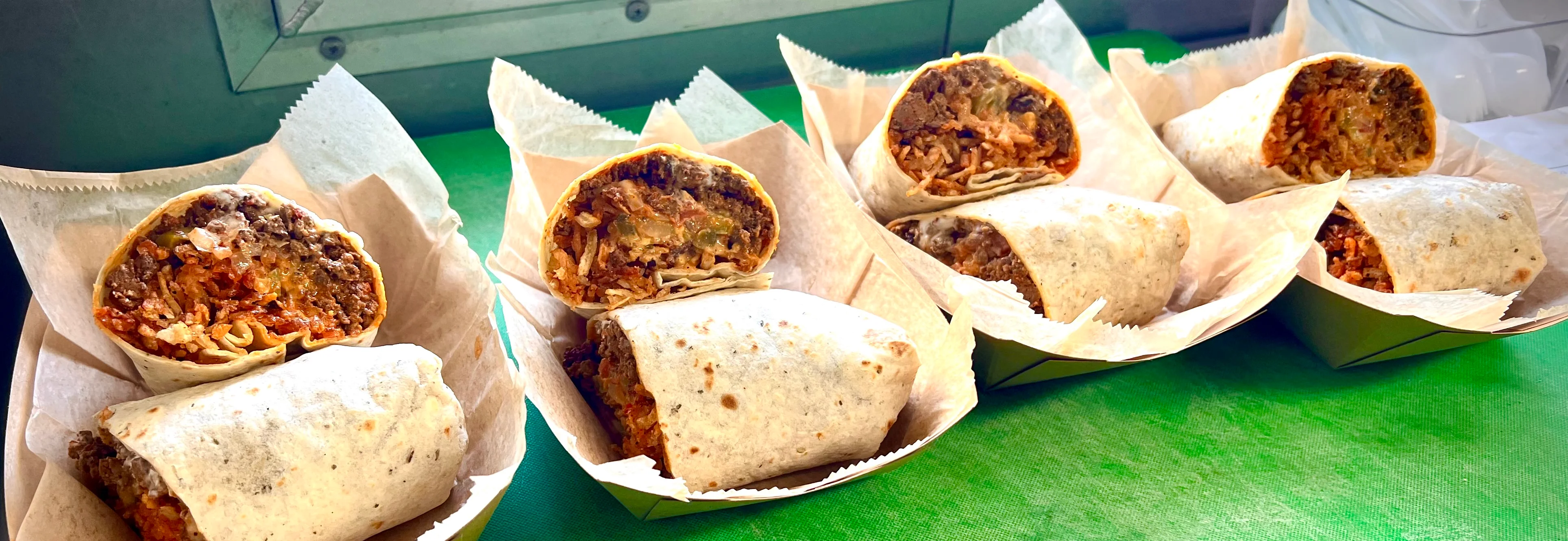 Delicious burritos served in a food truck