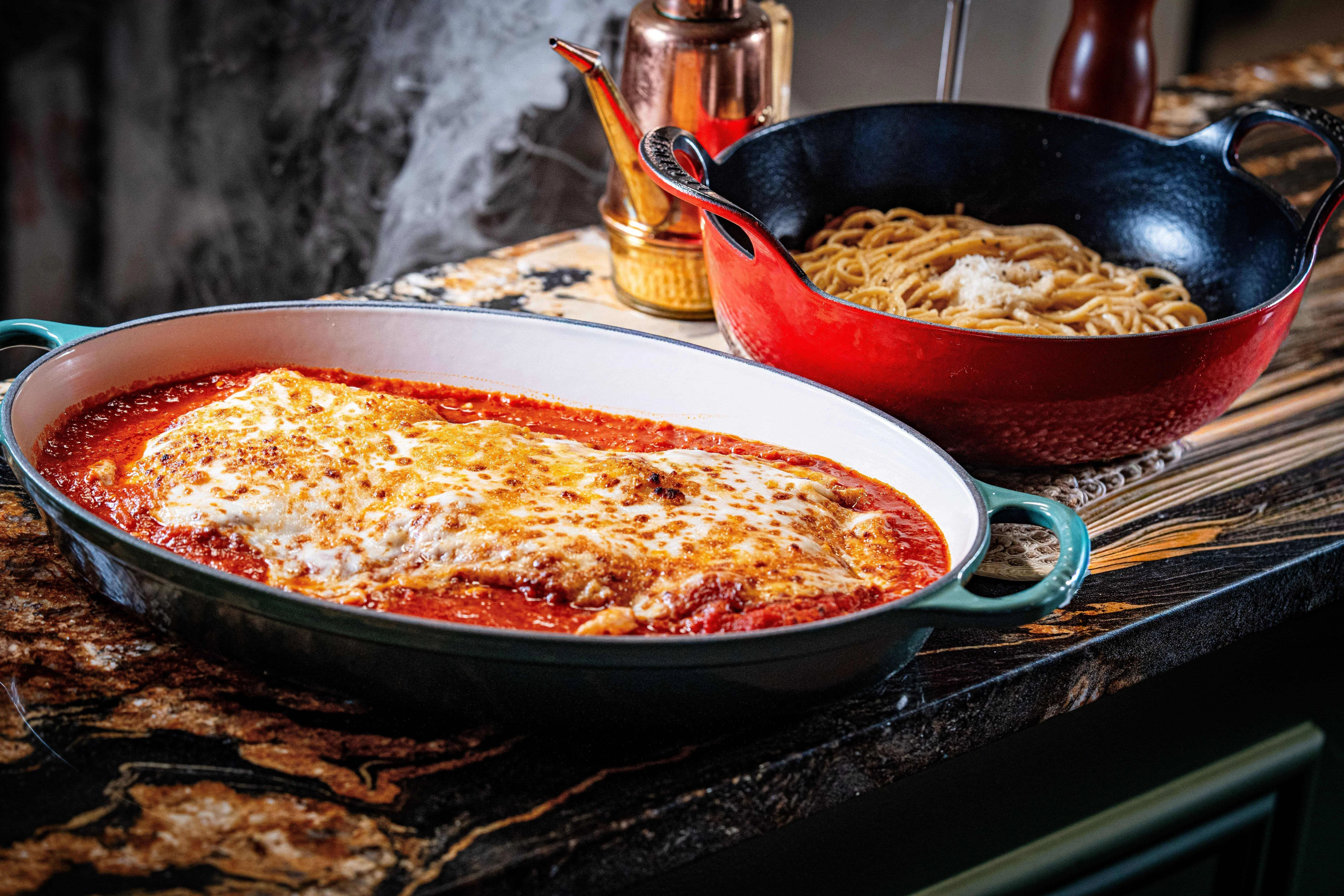 Italian lasagna with melted cheese in a rustic setting