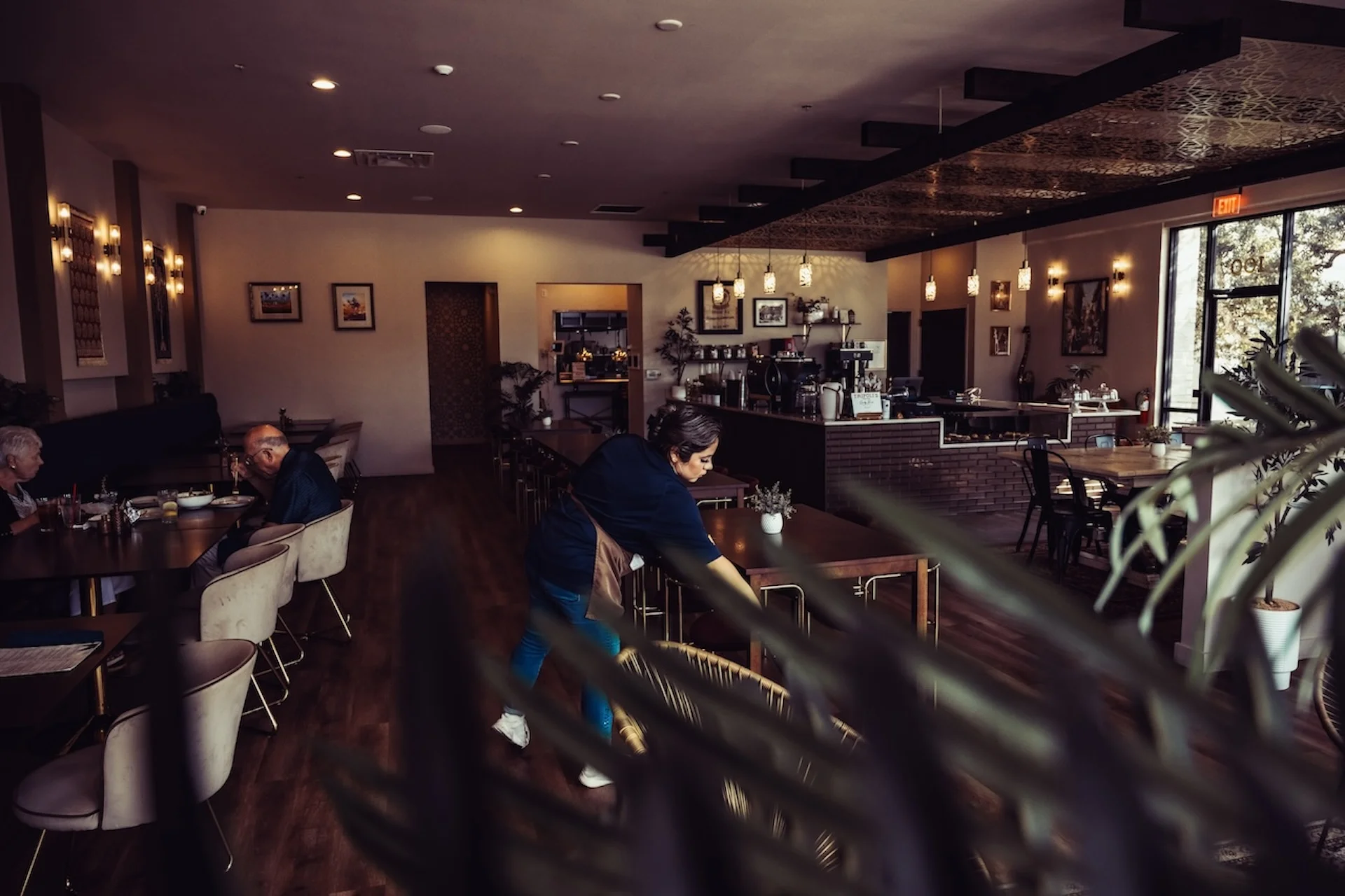 Cozy restaurant interior with modern decor and warm lighting