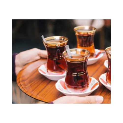 Turkish tea served in traditional glasses on a wooden tray