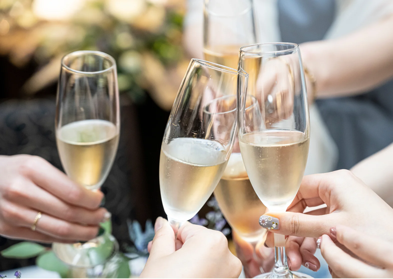 Cheers with champagne flutes at a celebration