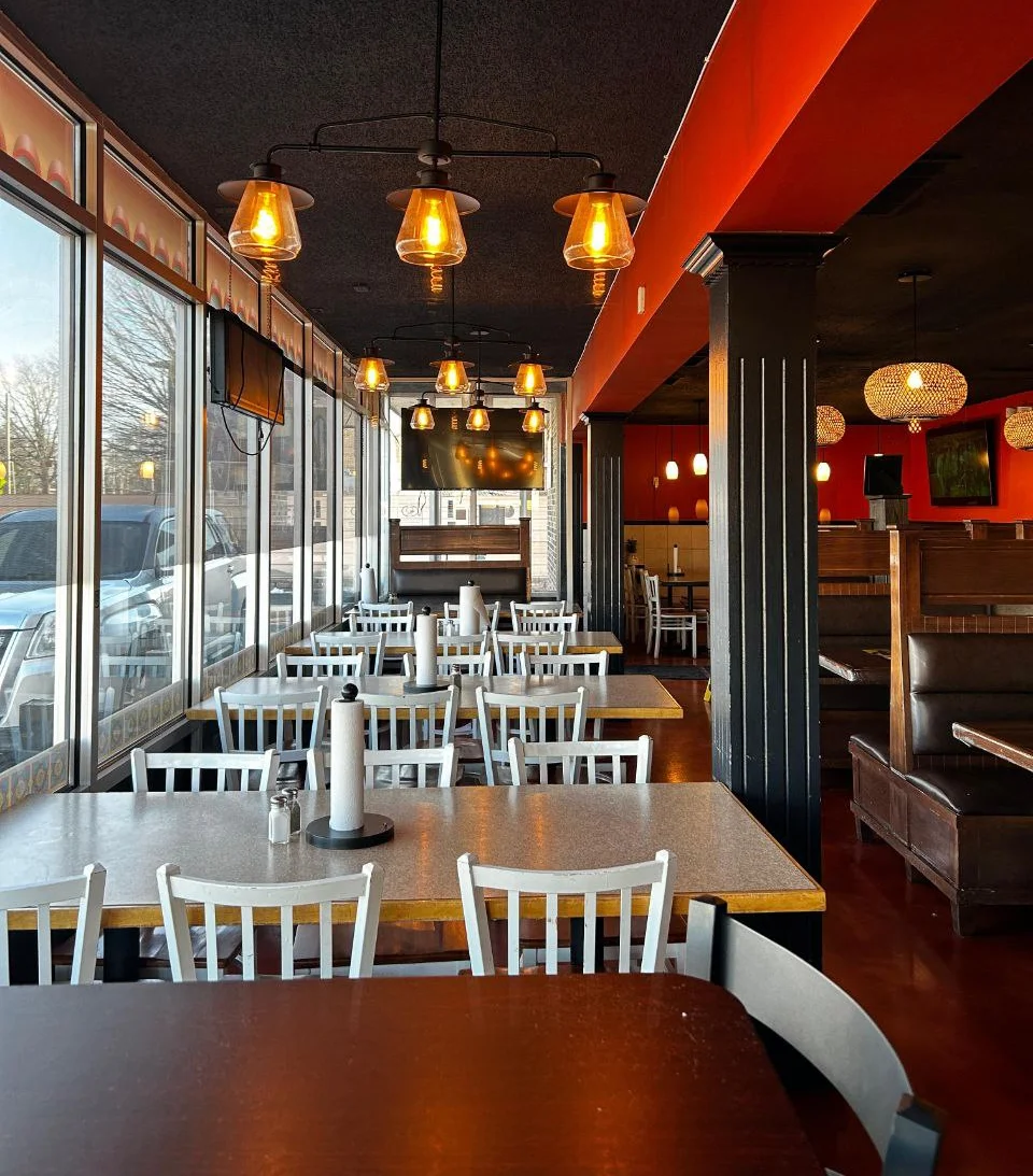 Delicious gourmet burger with fresh toppings on a wooden table