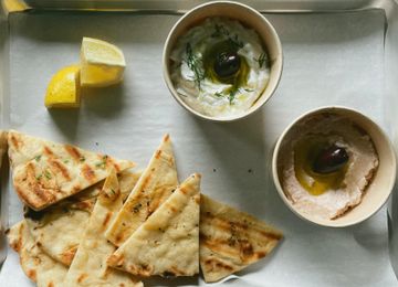 Dips with pita, carrots and celery