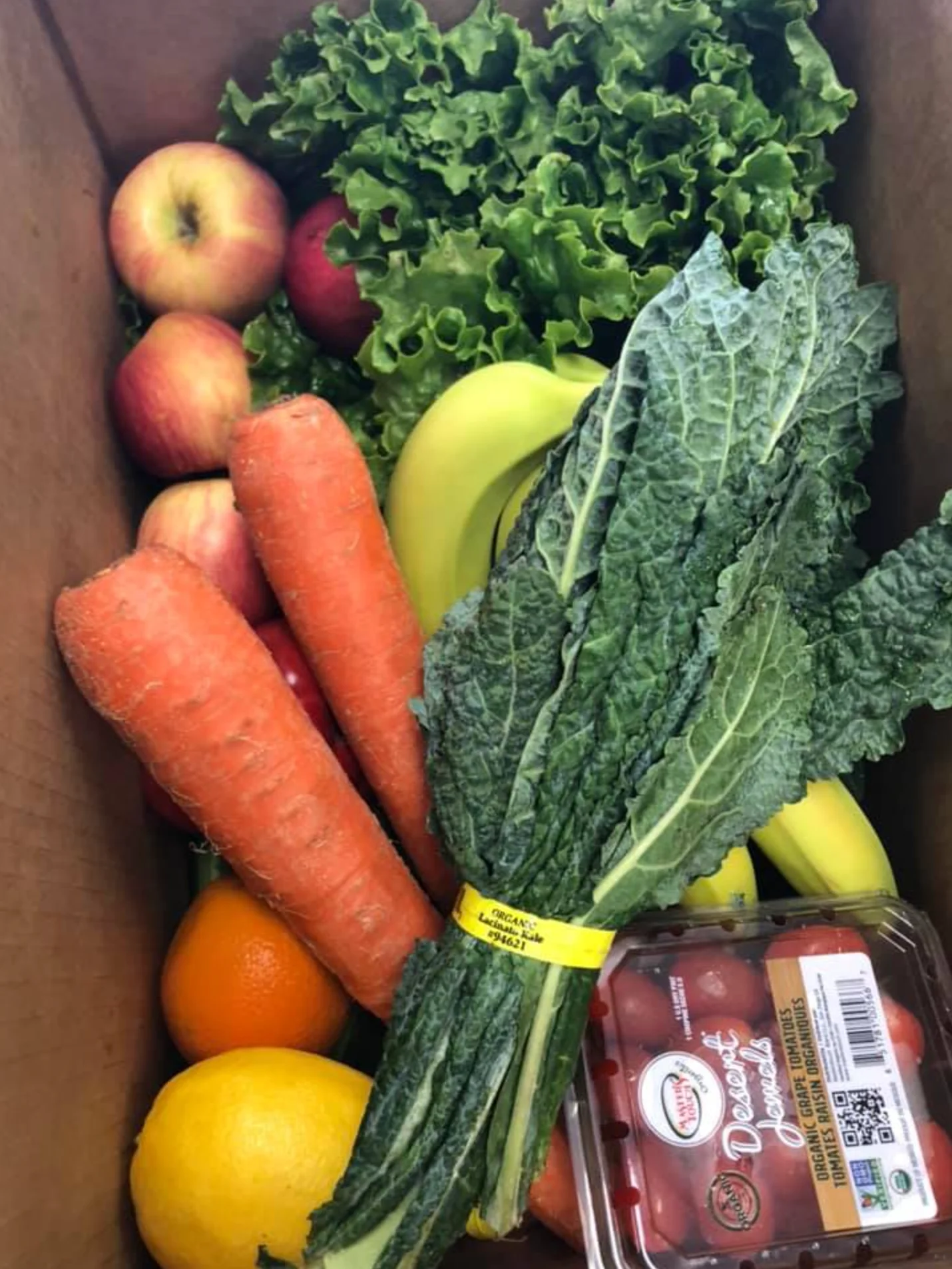 Fresh produce box with assorted fruits and vegetables