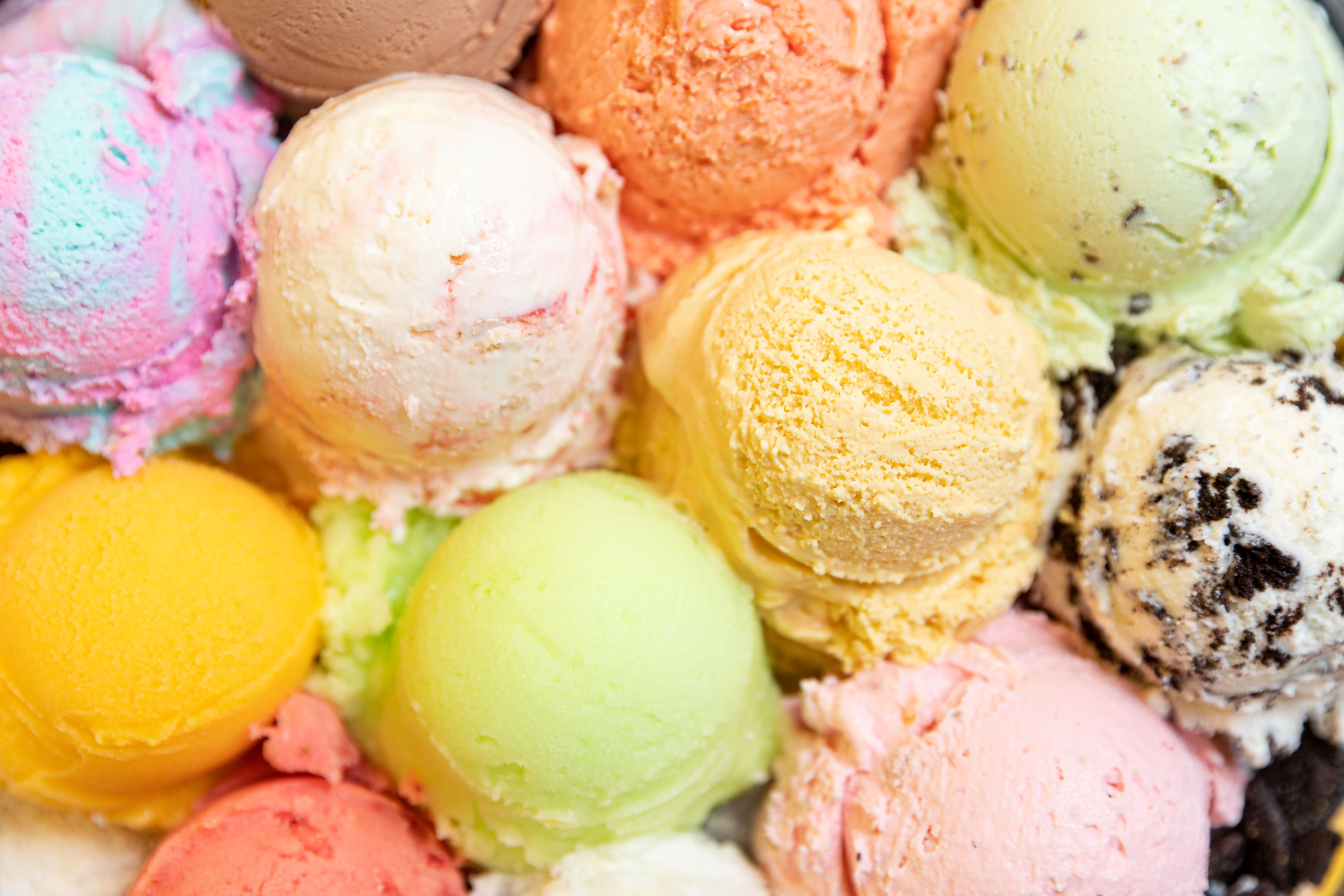 Colorful assortment of ice cream scoops in a dessert bowl