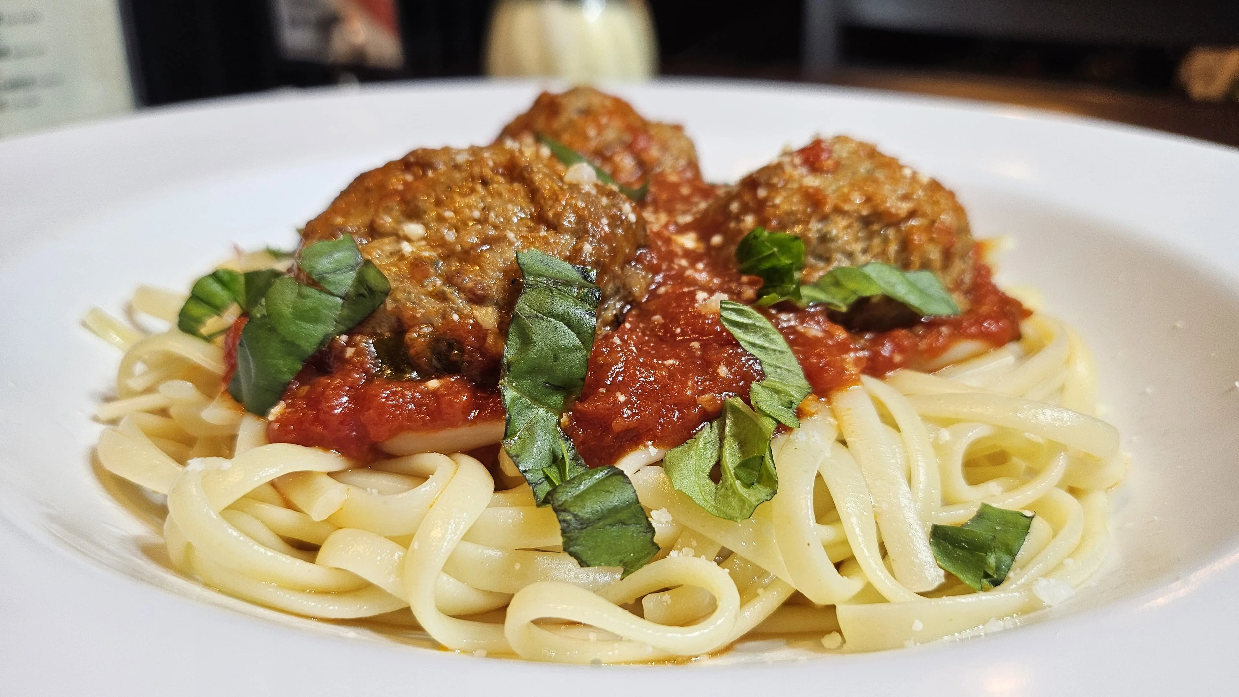Classic Italian spaghetti and meatballs with marinara sauce
