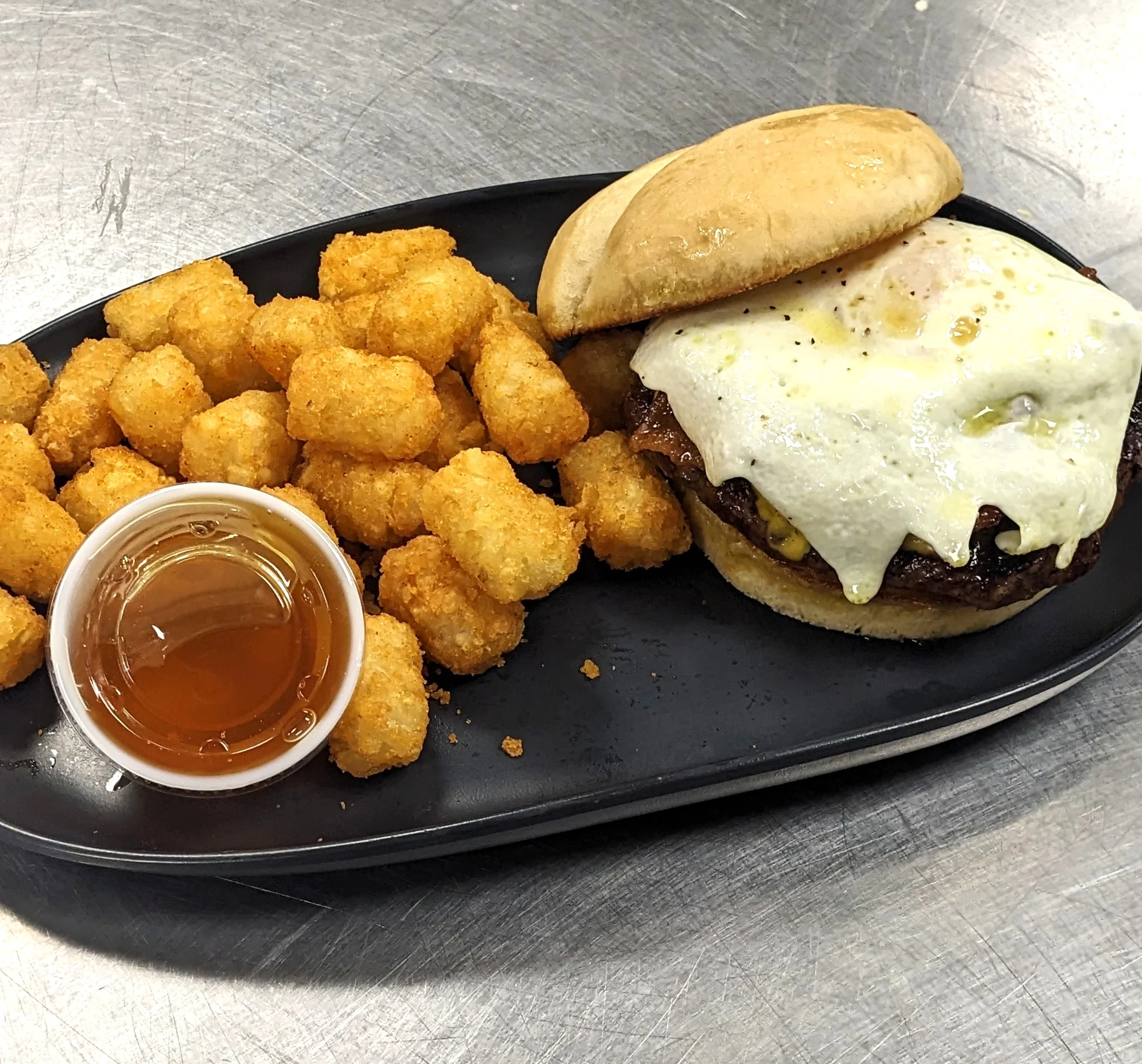 Breakfast Burger with tots and honey
