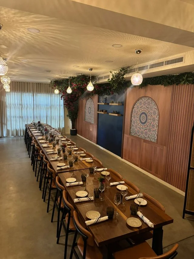 A warm and sophisticated setting at Sufrat Grill.
