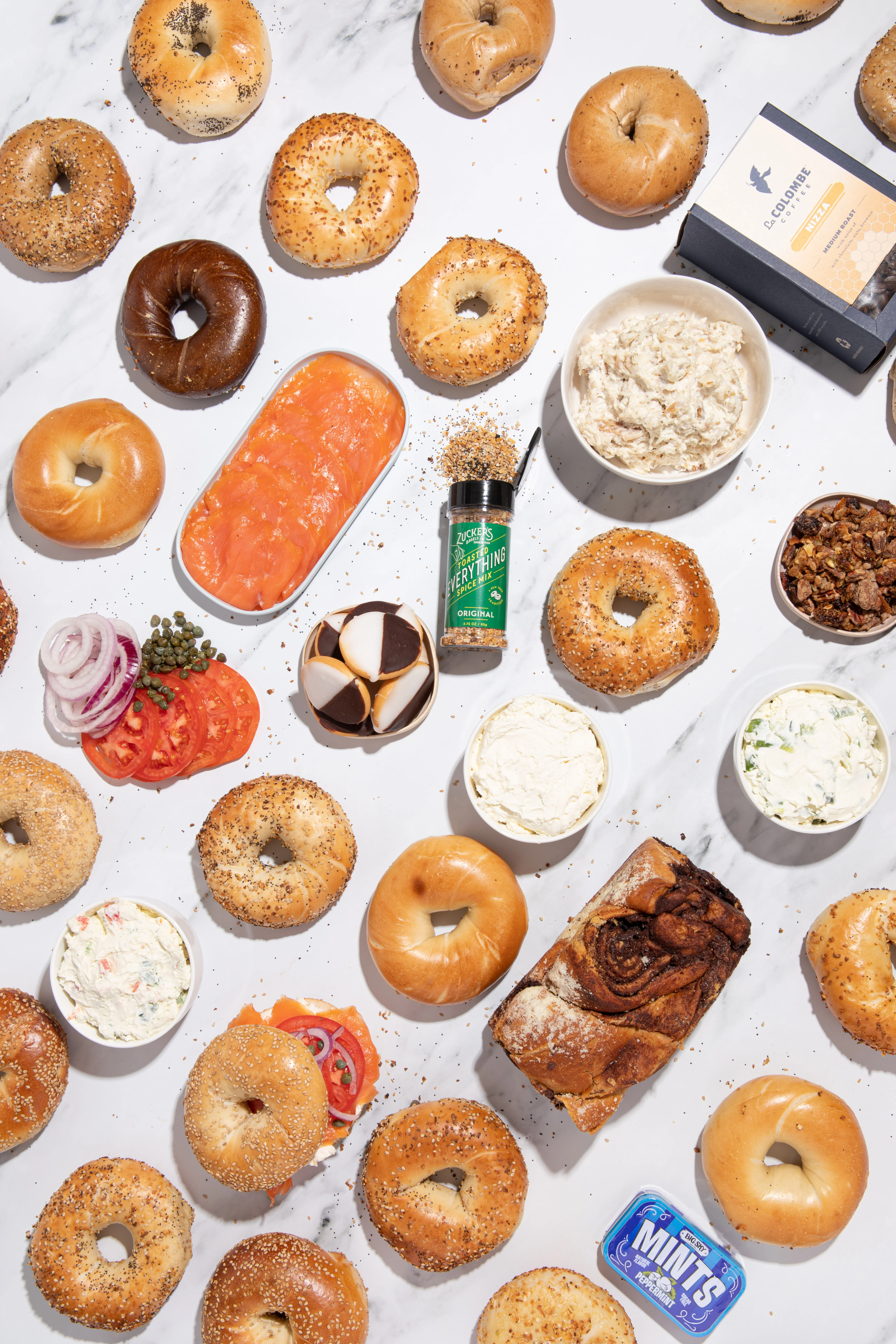 Assorted New York-style bagels with toppings and spreads