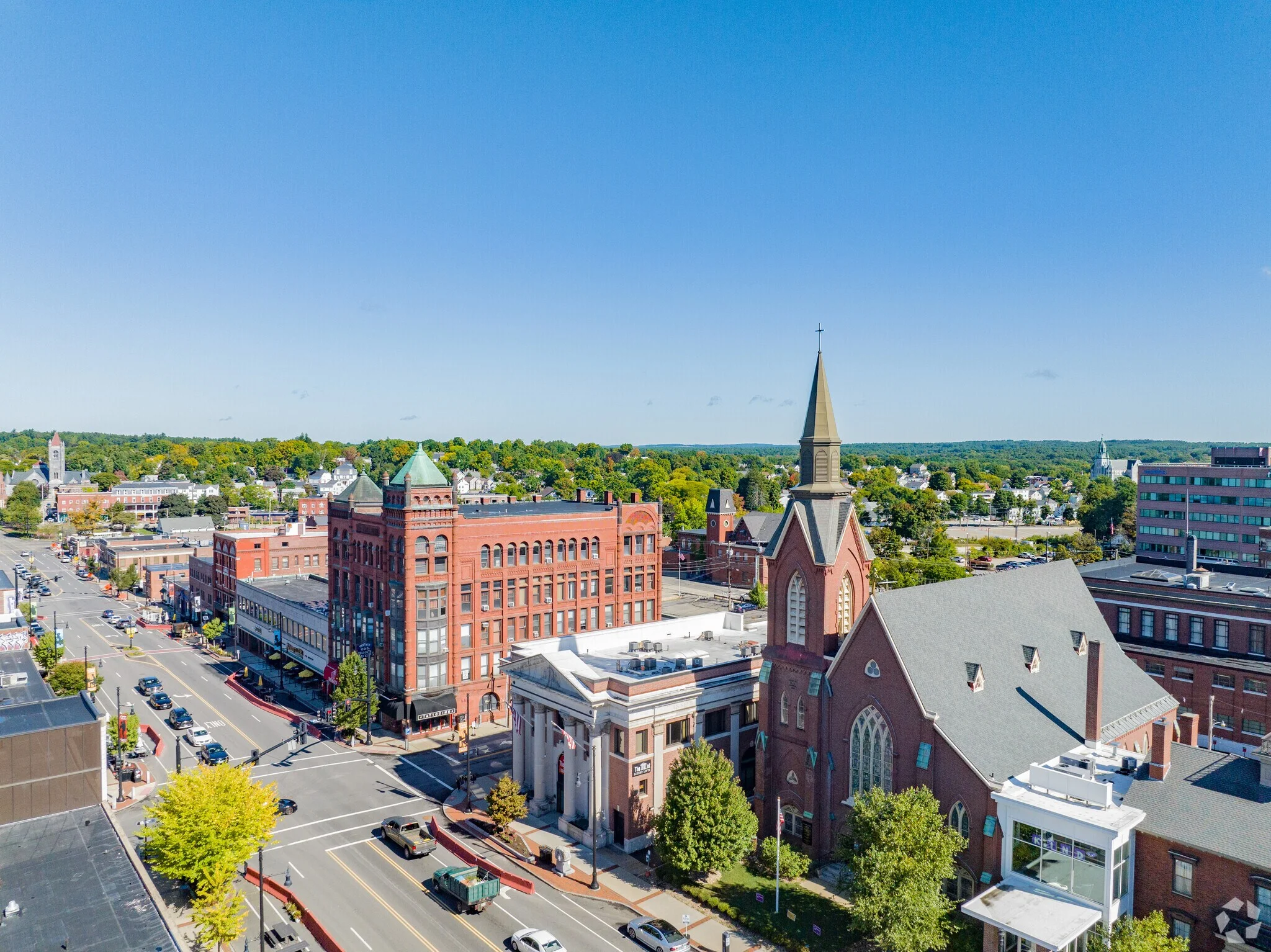 Aerial view of a vibrant downtown area with historic buildings