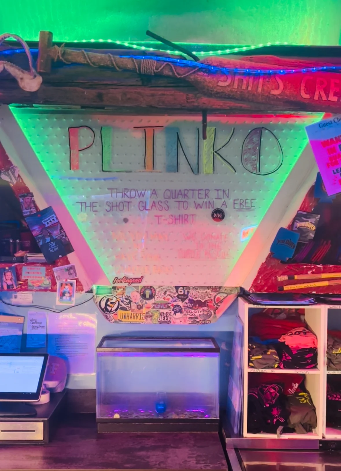 Interactive Plinko game at a vibrant bar