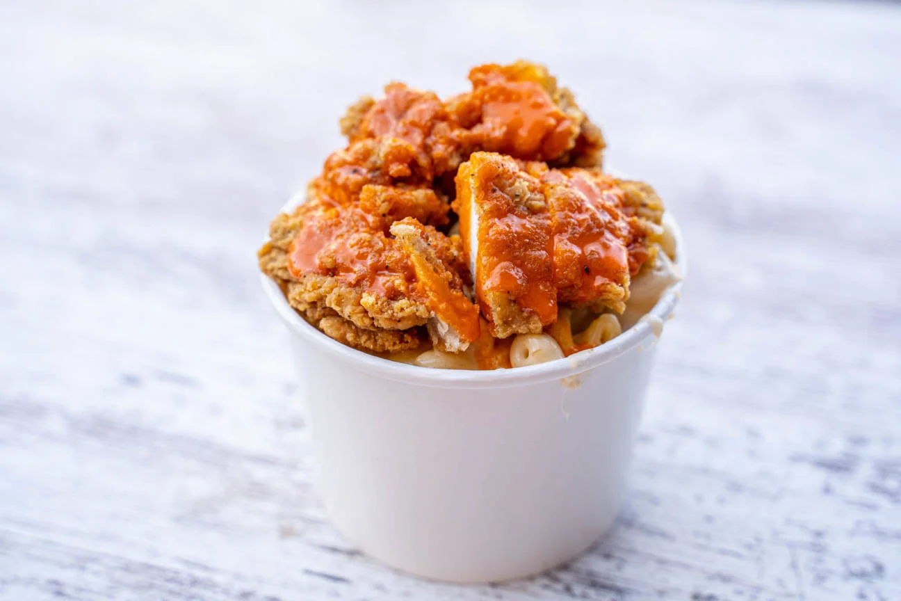 Southern fried chicken over mac and cheese