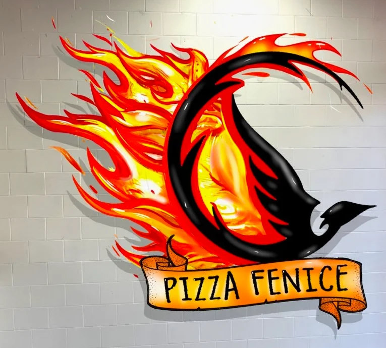 Vibrant logo of Pizza Fenice with flames and a phoenix design