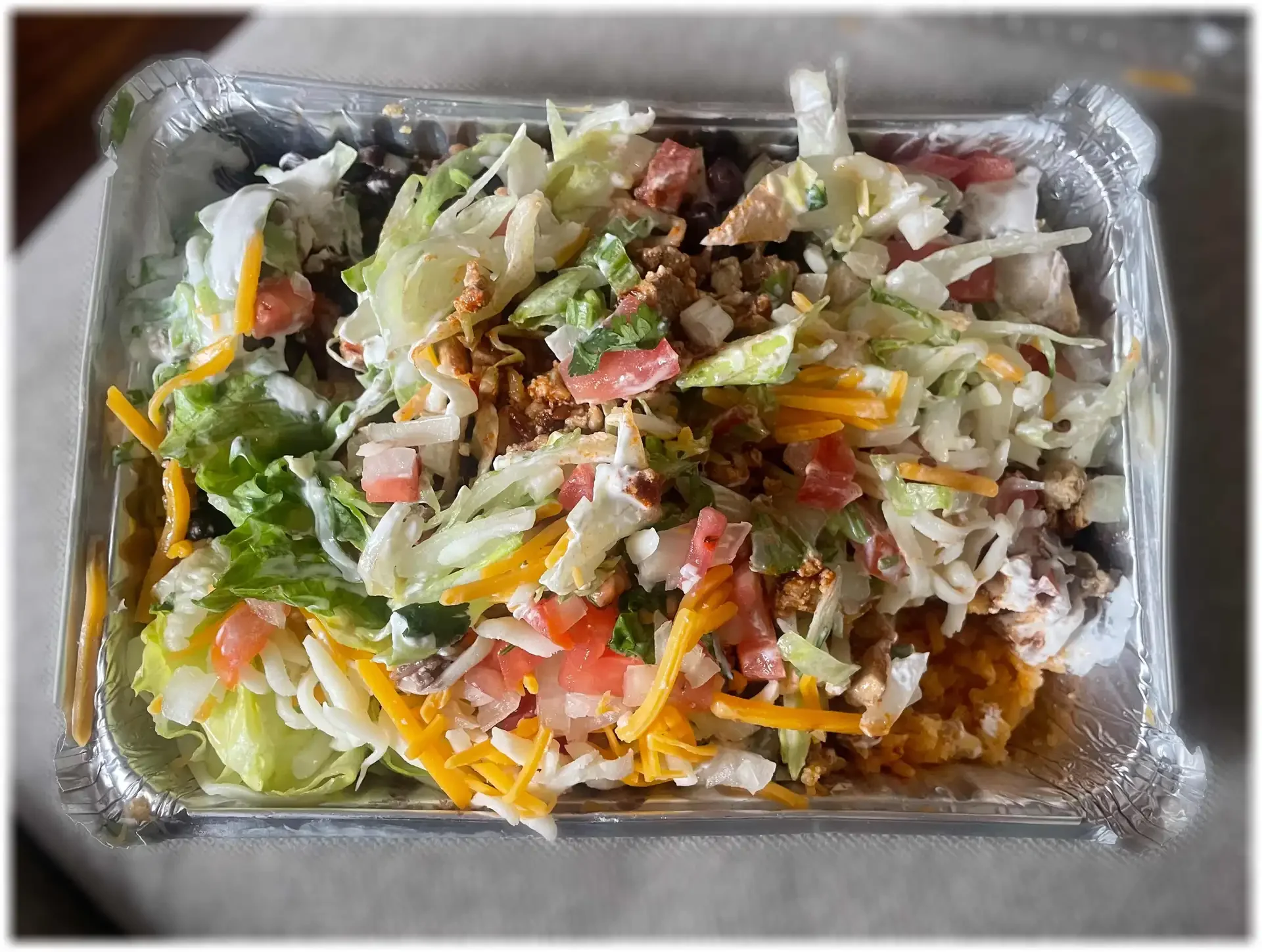 A fresh burrito bowl available for takeout or delivery from El Ranchito Poblano in Brooklyn.