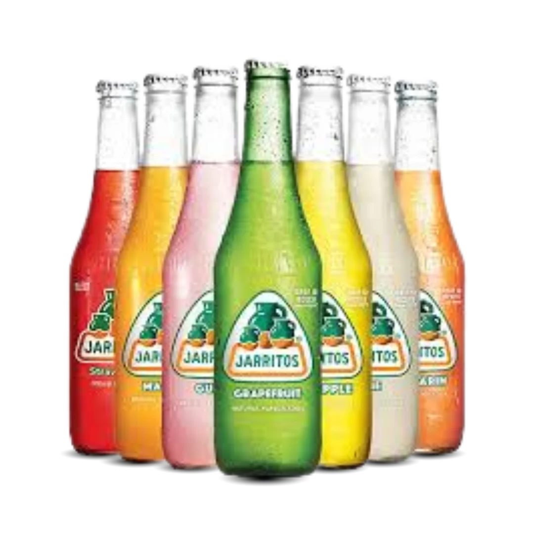 Two glass bottles of Jarritos soda: one yellow (Pineapple flavor) and one red (Fruit Punch flavor).
