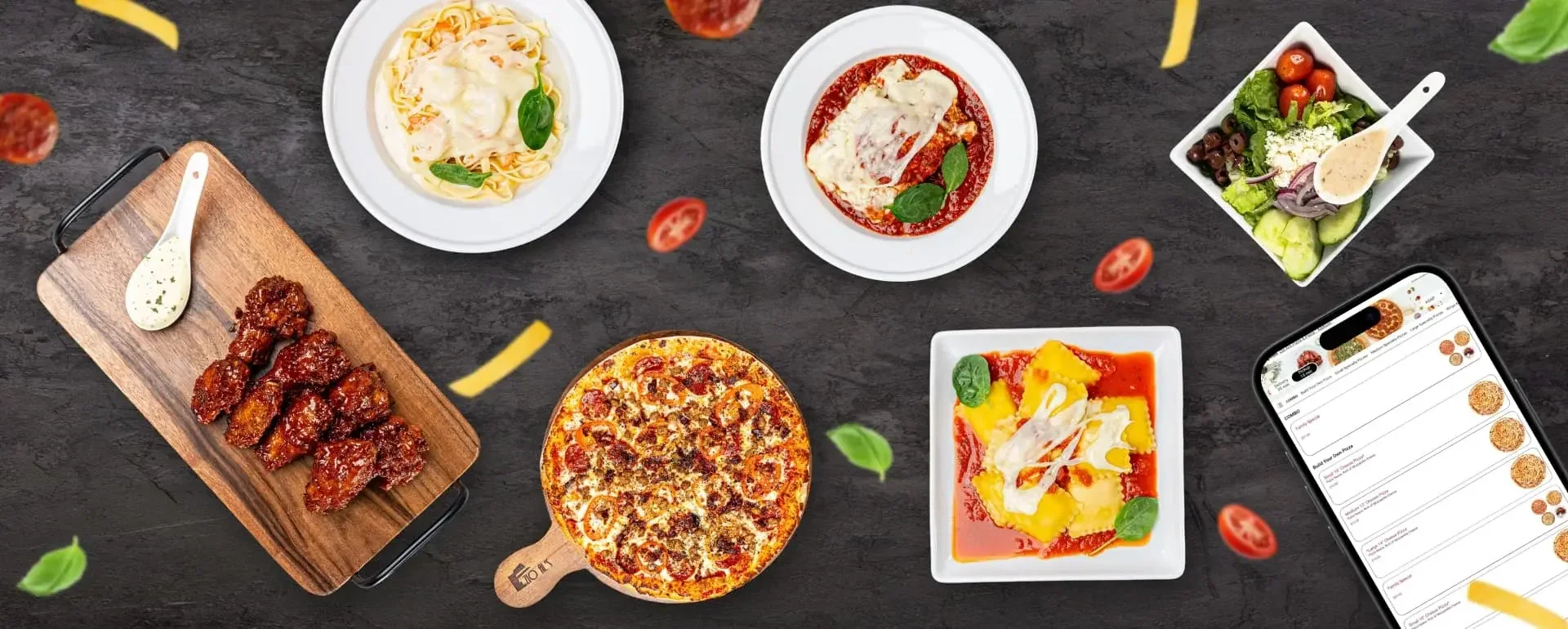 Italian feast featuring pizza, pasta, and salad