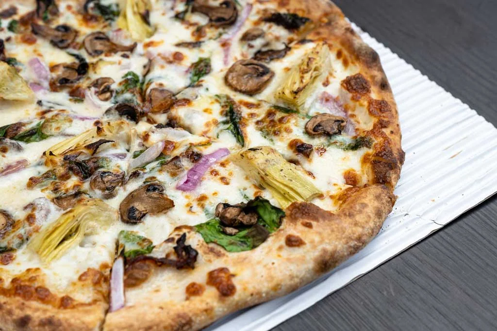 Mushroom and artichoke pizza