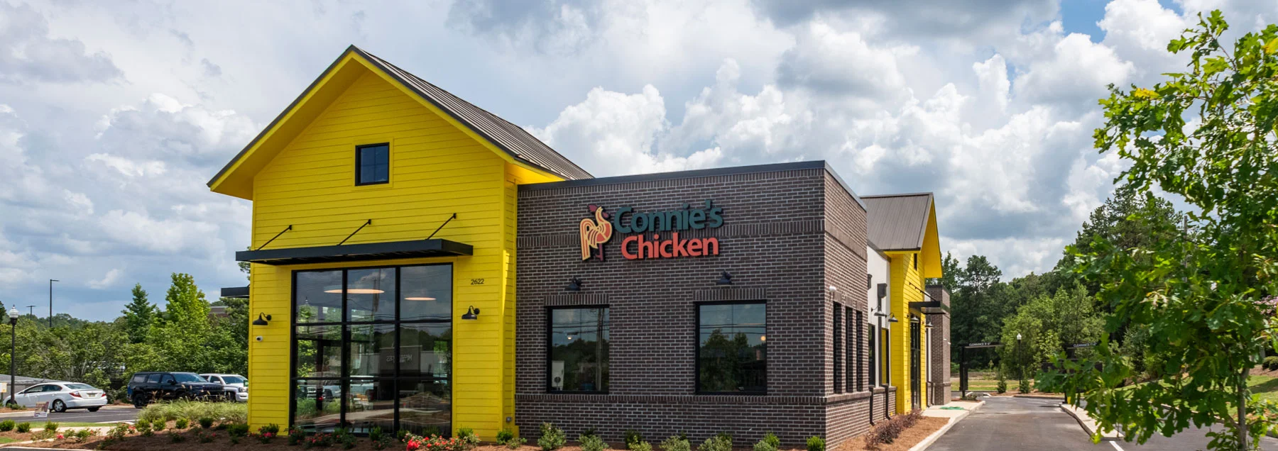 Bright yellow restaurant exterior with modern design