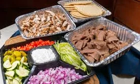 Mediterranean shawarma platter with assorted toppings