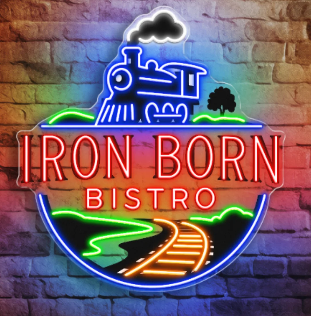 Neon sign for Iron Born Bistro featuring a vintage train design