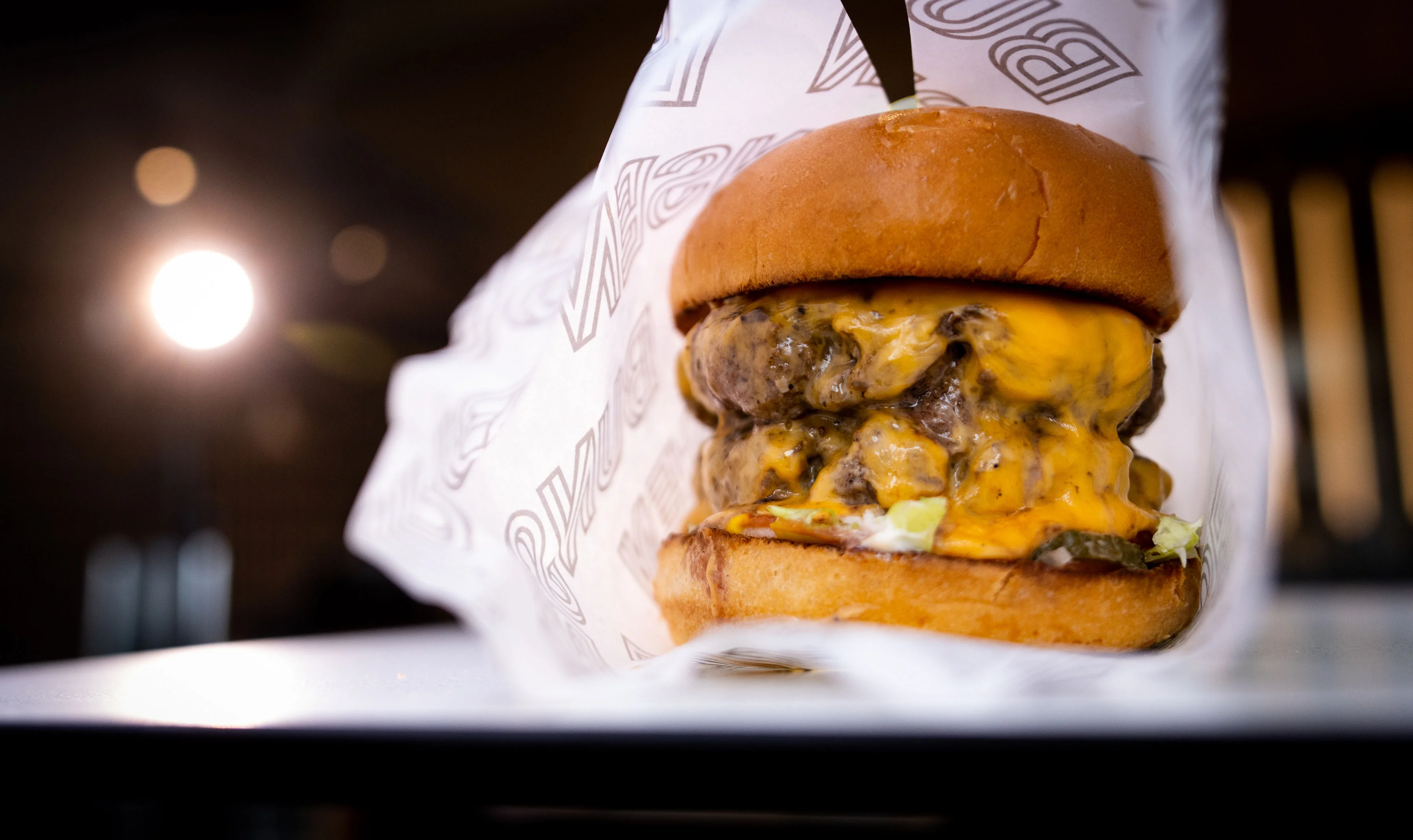 Juicy cheeseburger with melted cheese and fresh toppings