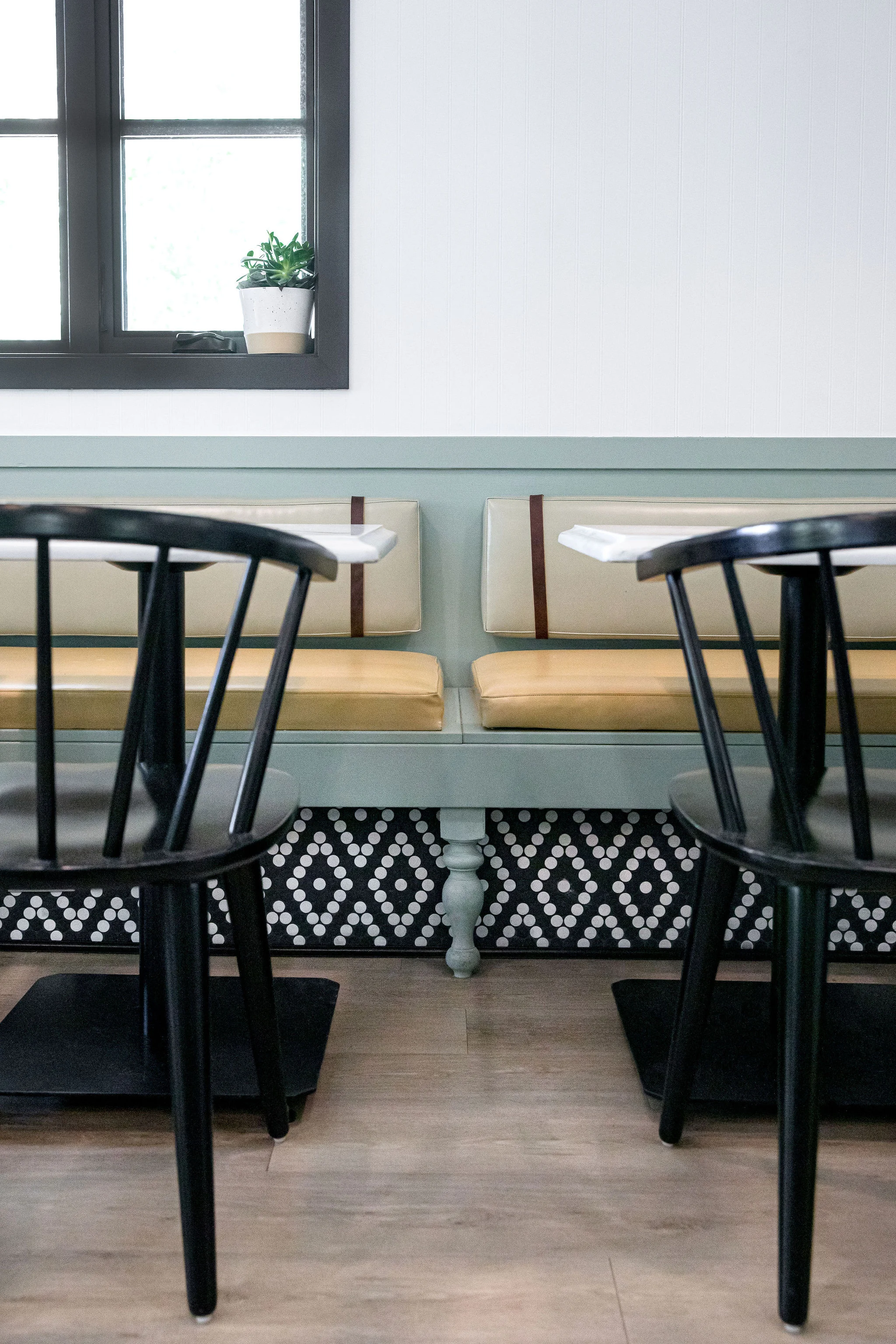 Cozy restaurant interior with stylish seating and natural light