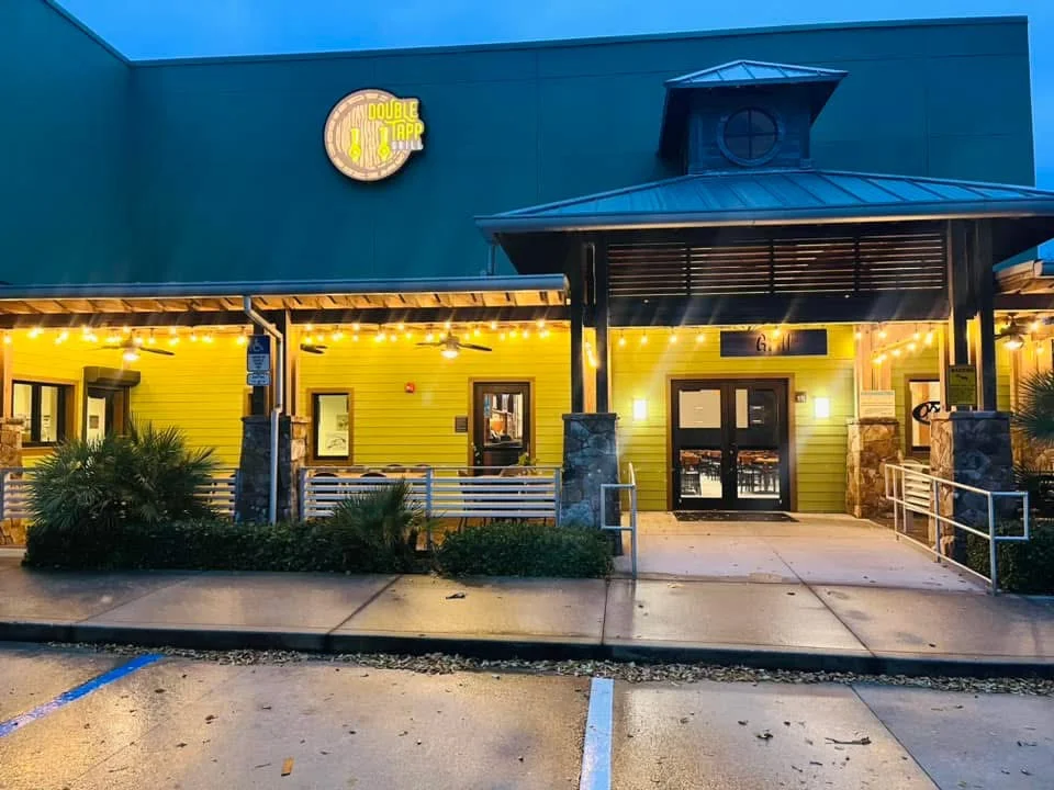 Exterior view of a vibrant restaurant with warm lighting