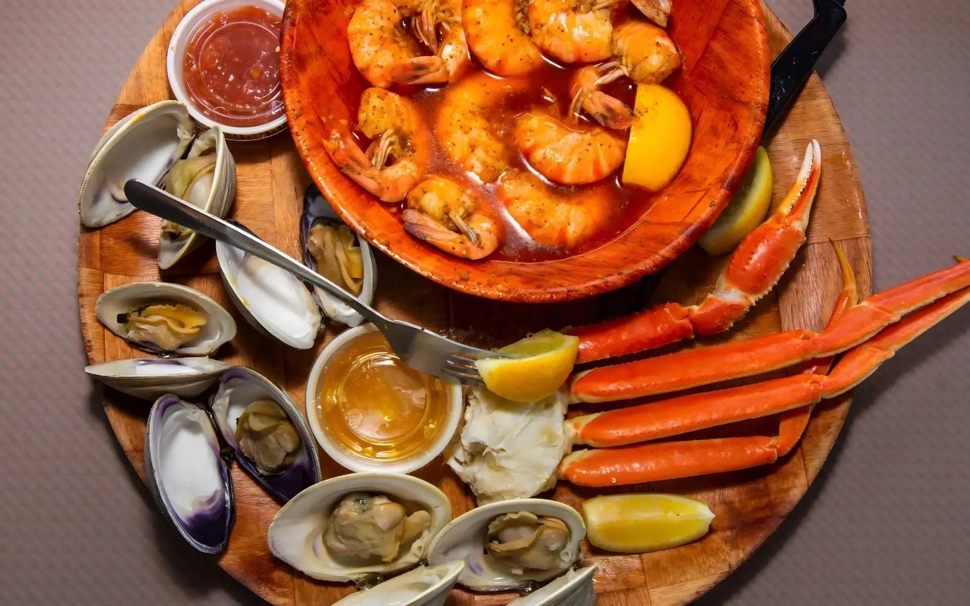 Steamed crab legs served with lemon and butter