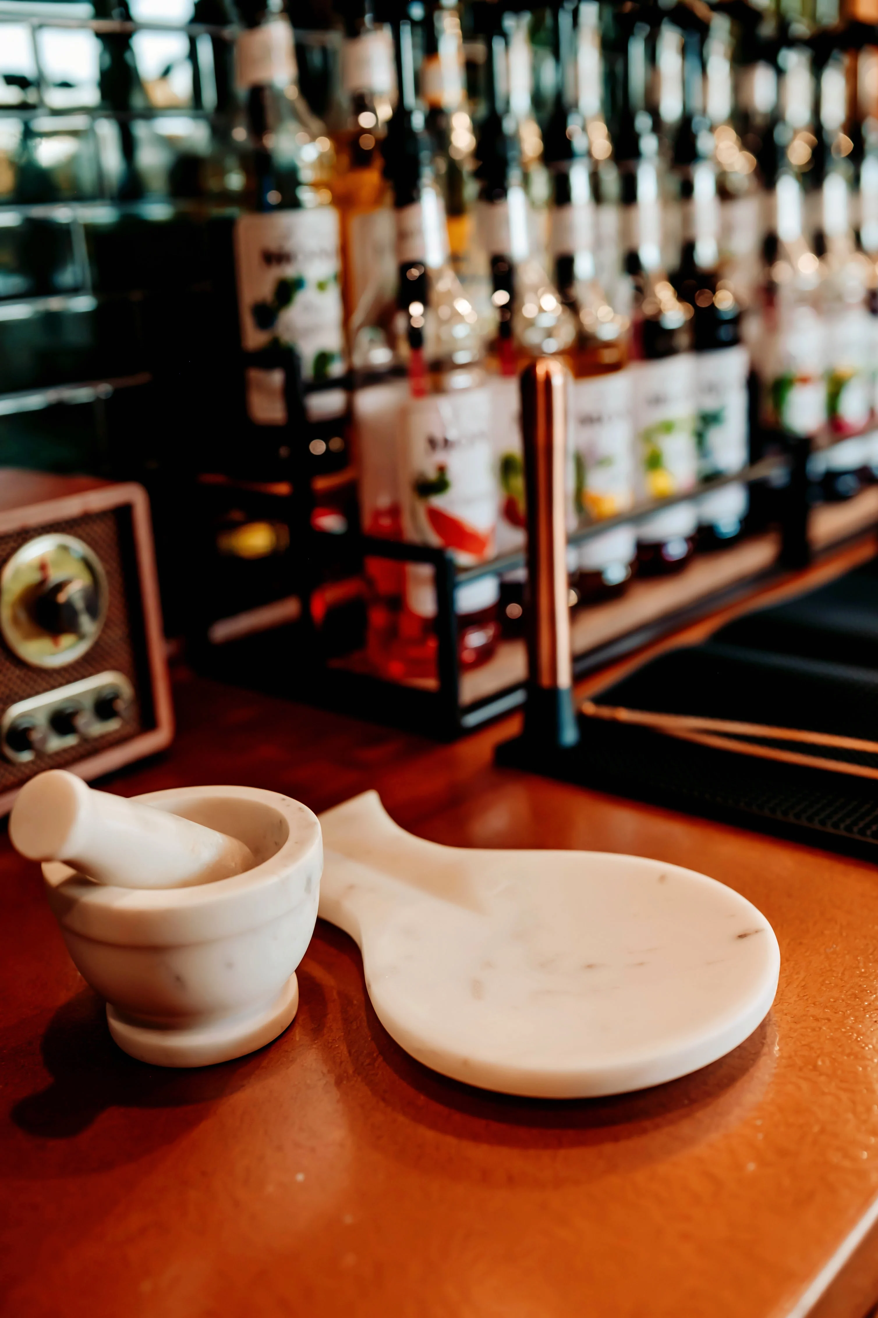 Marble mortar and pestle on a bar counter