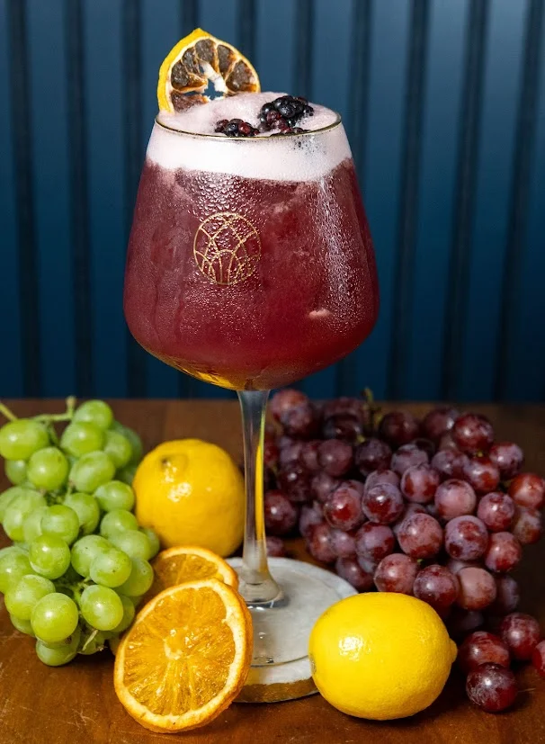 Autumn-inspired cocktail with pumpkins and rosemary