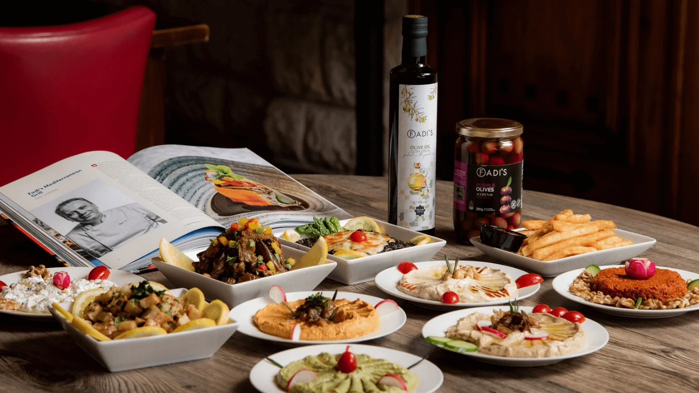 Assorted Middle Eastern dishes including kebabs and hummus