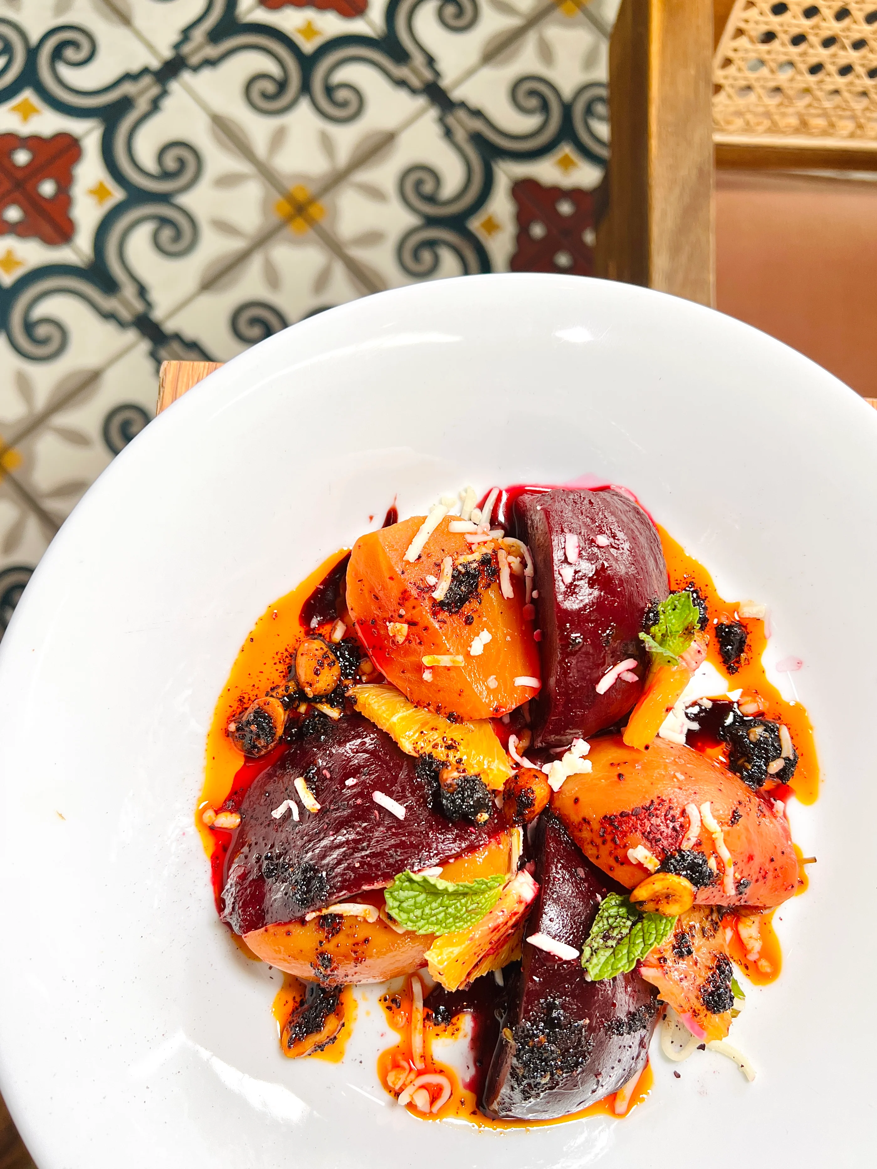 Artisan pasta dish with fresh herbs and a vibrant salad