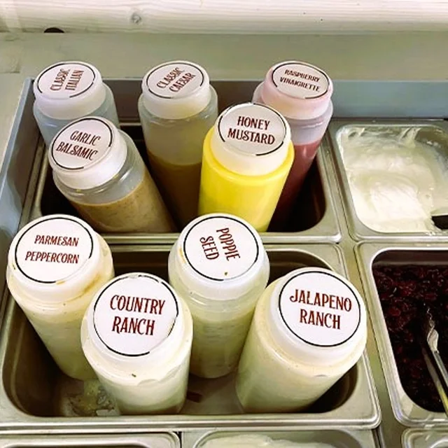 Variety of salad dressings in squeeze bottles