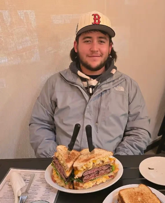 Giant American cheeseburger with sweet potato fries