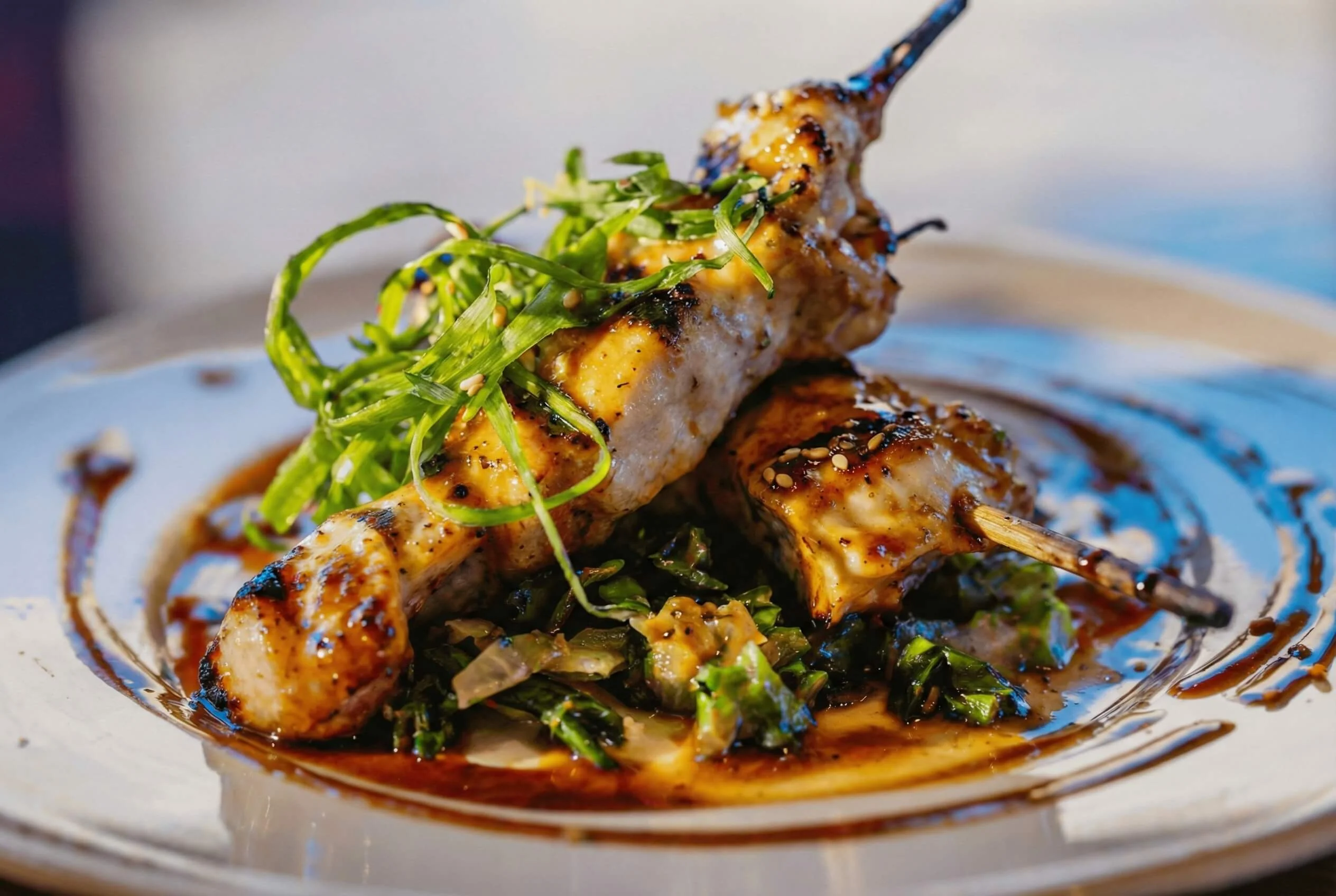 Grilled chicken yakitori with scallions