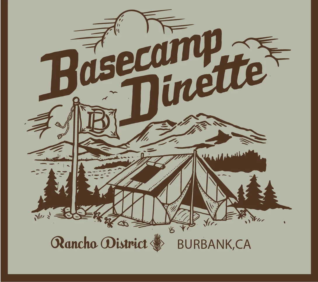 A vintage-style logo featuring a tent in a mountainous landscape with trees. The text reads 'Basecamp Dinette' along with the location details.