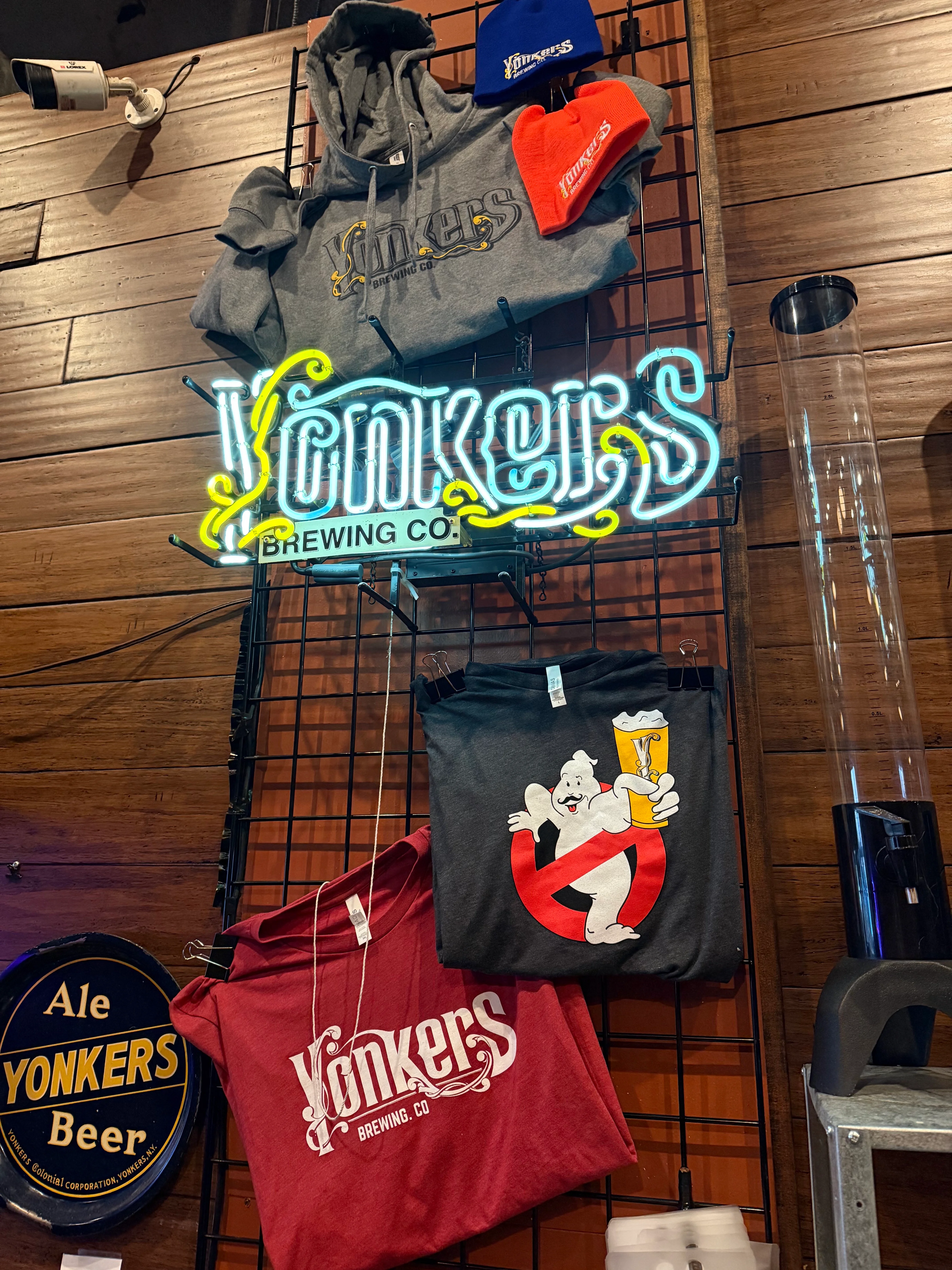 Yonkers Brewing Co. merchandise display with hoodies and t-shirts