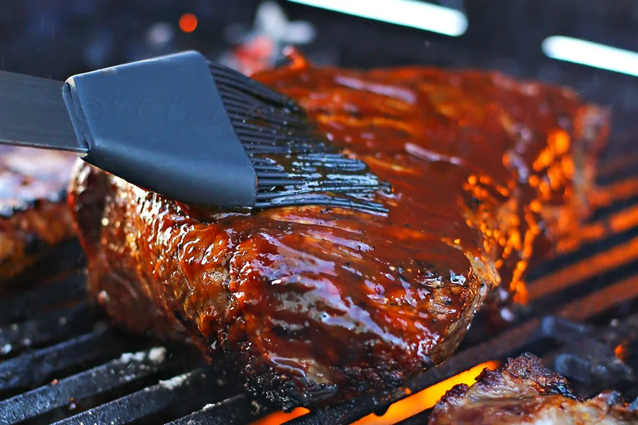 Grilled barbecue beef brisket on the grill