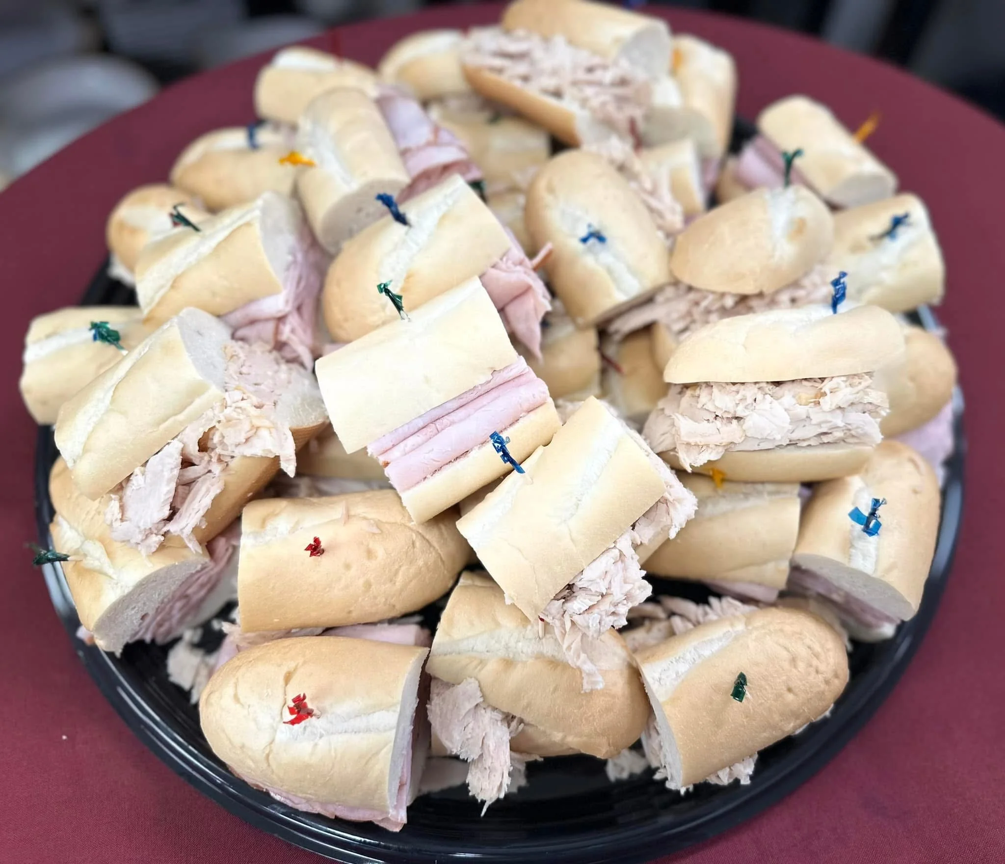 Platter of mini turkey sandwiches for catering