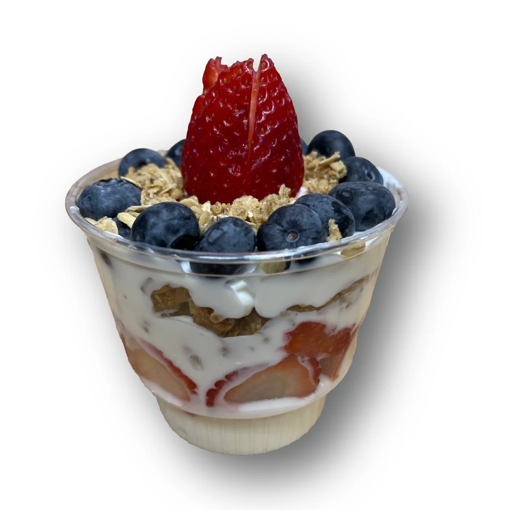 Layered yogurt parfait with strawberries and blueberries