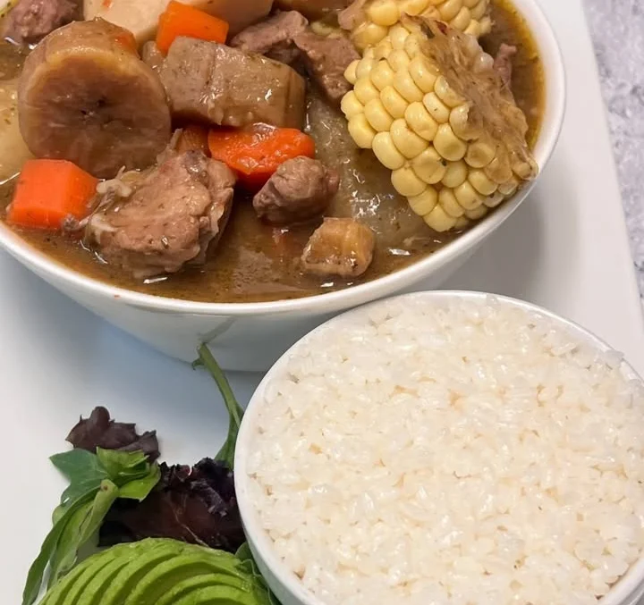 Hearty Jamaican oxtail stew with rice and vegetables