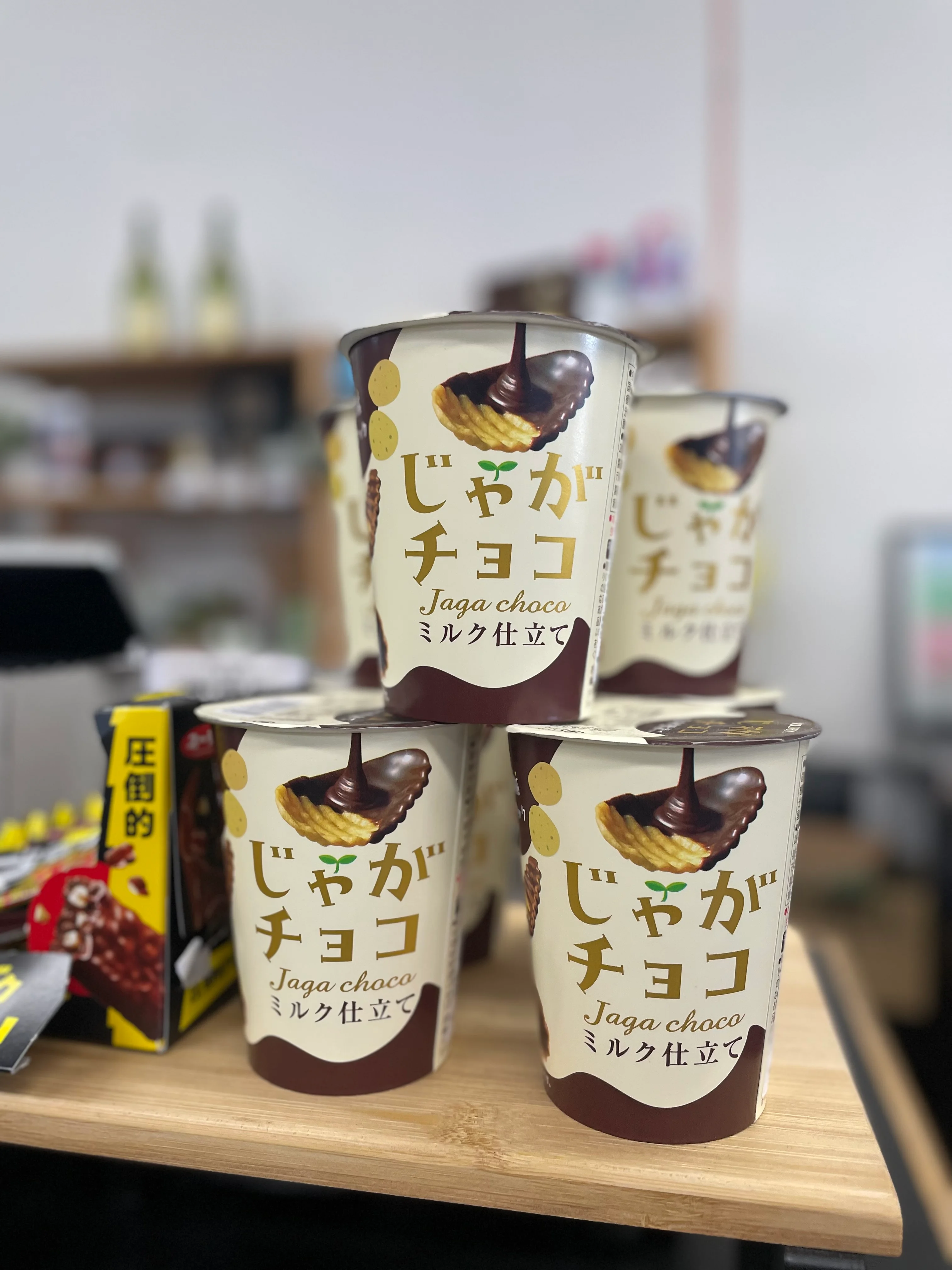 Japanese Jaga Choco snack cups stacked on a shelf