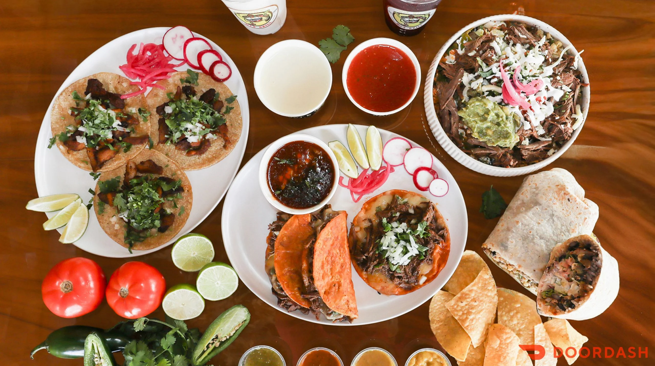 Authentic Mexican tacos with various toppings and salsas