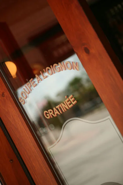 Elegant restaurant signage for French onion soup