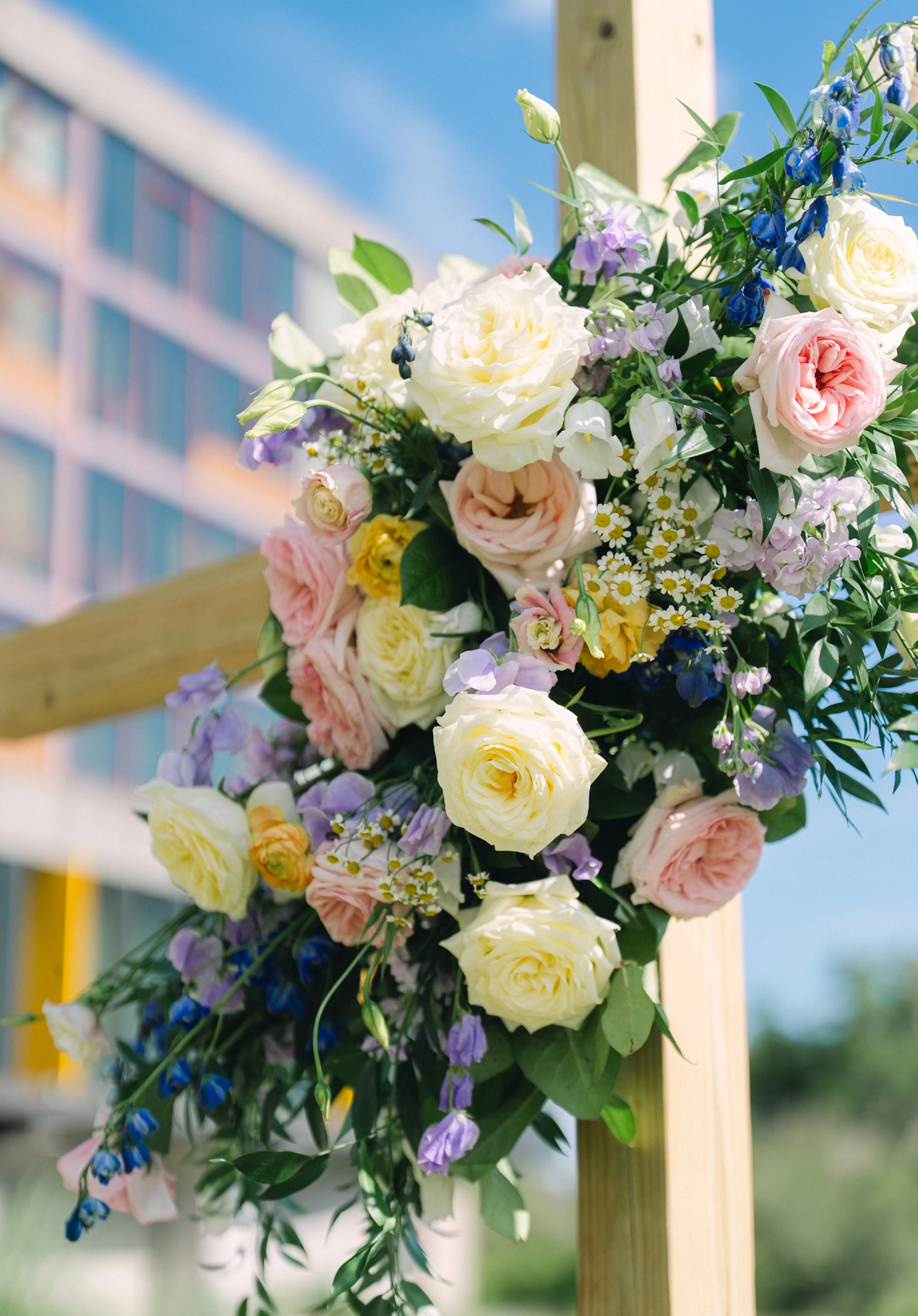 Colorful floral arrangement on a wooden structure
