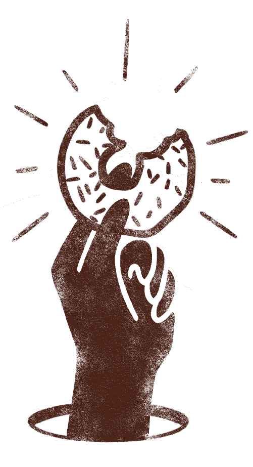 Hand holding flavorful donut