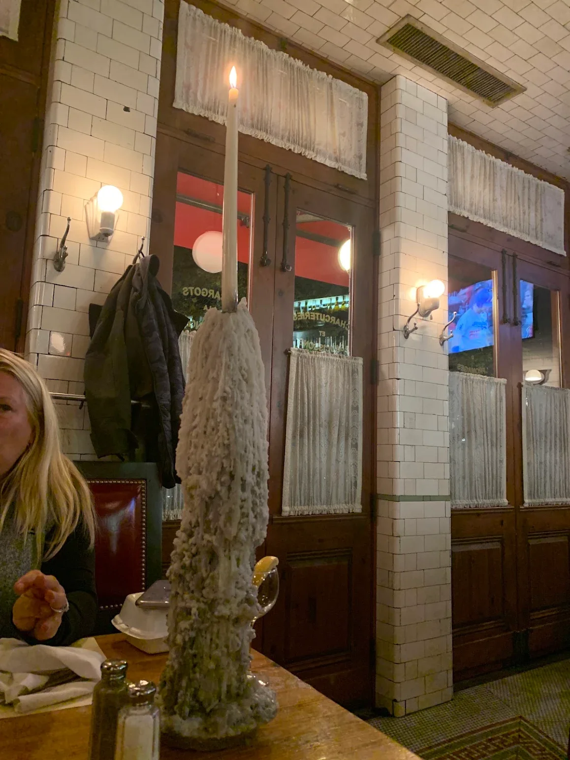 Cozy restaurant interior featuring a unique candle centerpiece