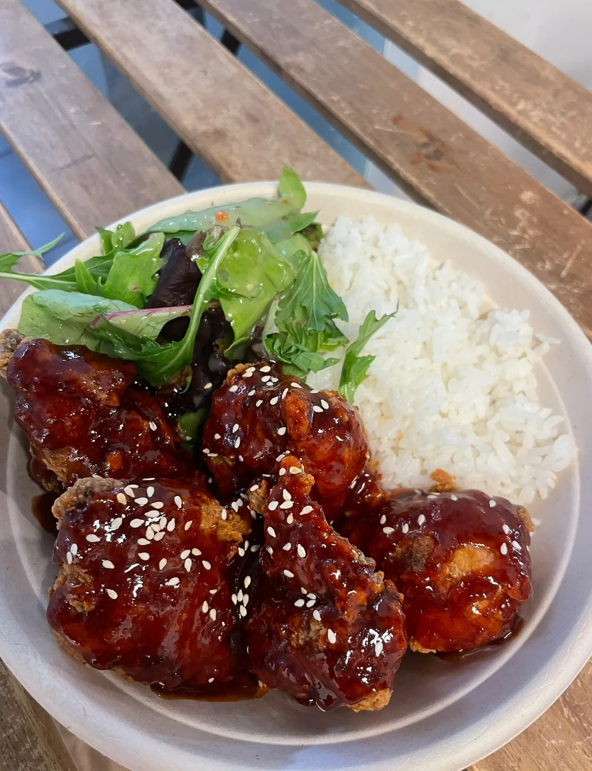 Korean fried chicken with rice and salad